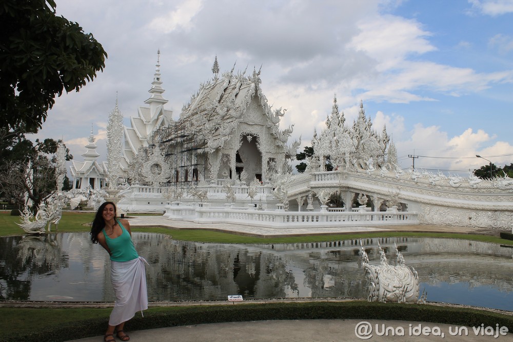 Image of a woman in front of the White Temple in Chiang Rai, Thailand