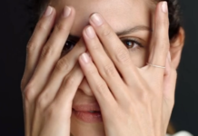 Wholesale Horror – Ongoing Chaos Redeeming Sam’s Club Mastercard Rewards a woman covering her face with her hands