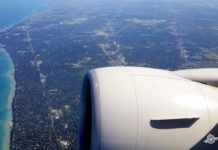 (1 New, 9 In Total) Every Available Transfer Bonus & A History Of Transfer Bonuses an airplane wing and a city