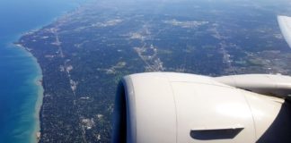 (1 New, 8 In Total) Every Available Transfer Bonus & A History Of Transfer Bonuses an airplane wing and a city