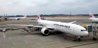 Yowza! JAL and ANA to Nearly Double Fuel Surcharges Starting May 1st a large white airplane at an airport