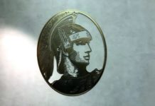 American Express Platinum Card Benefits: Over 40 Unique Perks You Need To Know About a gold framed picture of a man in a helmet