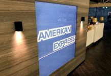 Already?! An American Express Benefits January Progress Report a sign on a wall