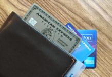 End of Month Checklist: Credits, Spending Offers & Card Perks a wallet with credit cards and cards on a table