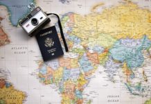 State Department Facing Unprecedented Demand for US Passports a camera and passport on a map