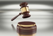 Comcast Agrees to $117 Million Settlement Over 2023 Data Breach a gavel on a podium