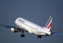 Air France La Premiere Award Booked! I Have Thoughts. a white airplane in the sky