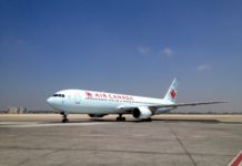 Chase Aeroplan Card Review – Great for Those Seeking Status a white airplane on a runway