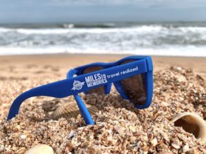 MtM logo, miles to memories, beach stock (2) sunglasses on the beach