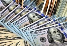 Chasing Ultimate Rewards Redemption Back to this Entry Level a stack of money on a table