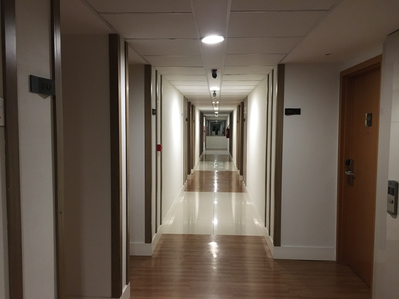 The hallway has reduced lighting