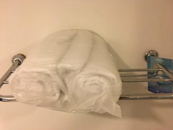 Towels in plastic wrap at the hotel