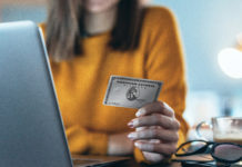 Amex Making Platinum Card Changes, Removing Events With AmEx and Uber VIP a person holding a card