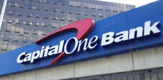 Earn Up to 400,000 Bonus Miles with Capital One Venture X Business Card, Offer Ends Jan. 19 a blue sign with white text on it