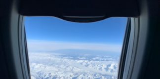 Why My Latest Credit Card Application Plan Quickly Went Off The Rails a view of snowy mountains from an airplane window