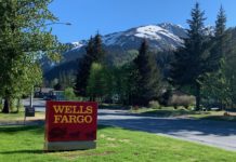 Wells Fargo Tells Chase To Hold Their Beer With Newest Transfer Partner a sign on the grass