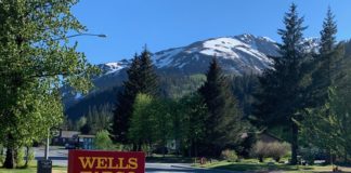 Wells Fargo Tells Chase To Hold Their Beer With Newest Transfer Partner a sign on the grass