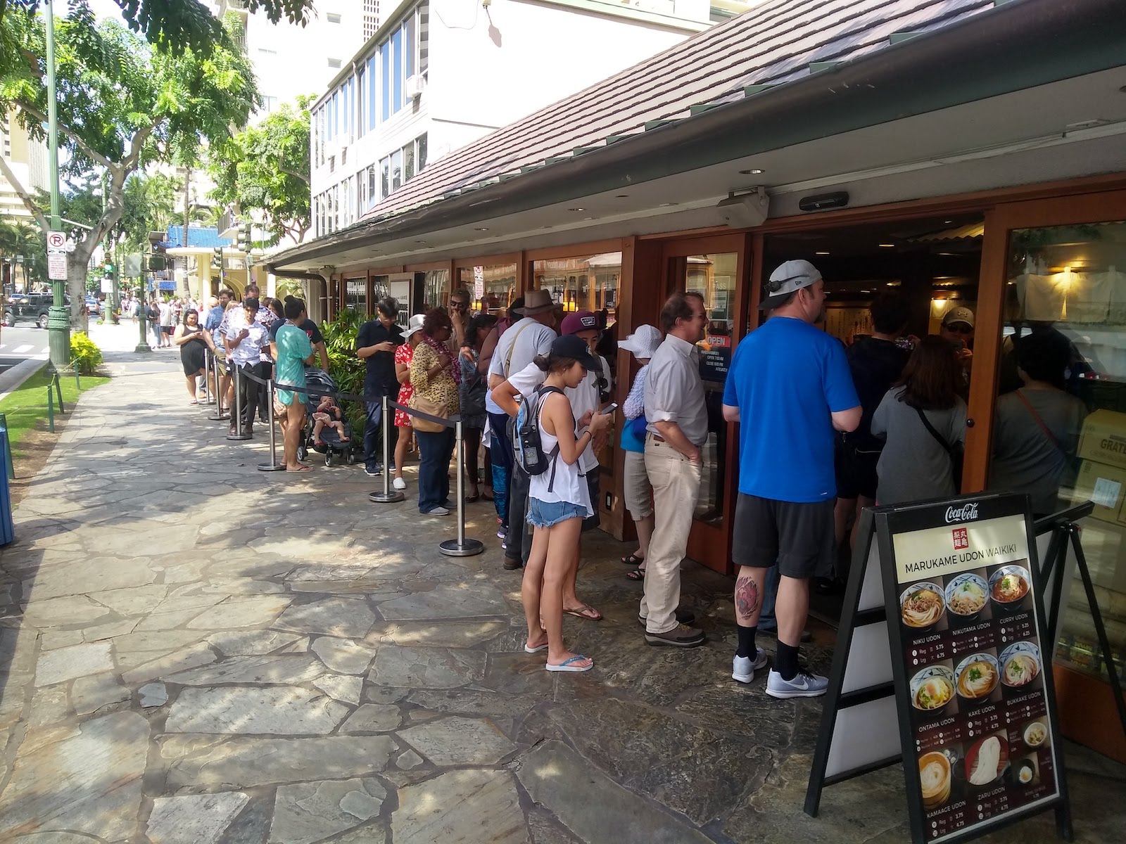 A line waits outside Marukame Udon in Waikiki, Oahu