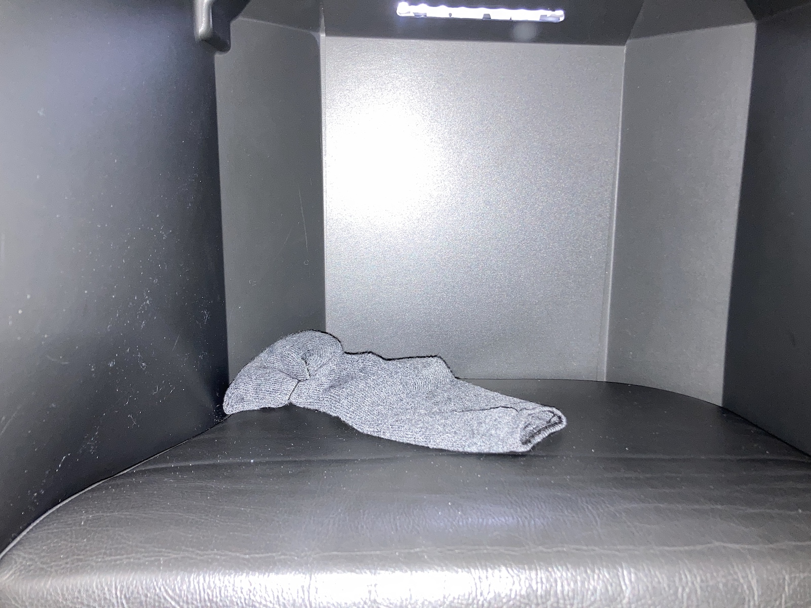 Image of dirty sock left behind in business class seat, another reason my SAS review is negative.