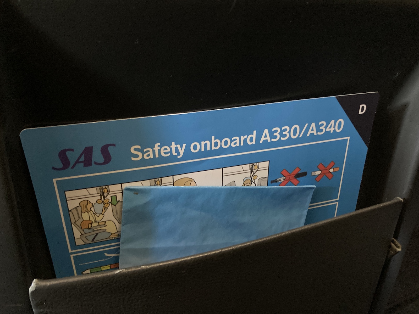 Location of safety information in SAS A330 business class