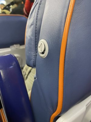 Image of coat hook on Aeroflot economy seat 
