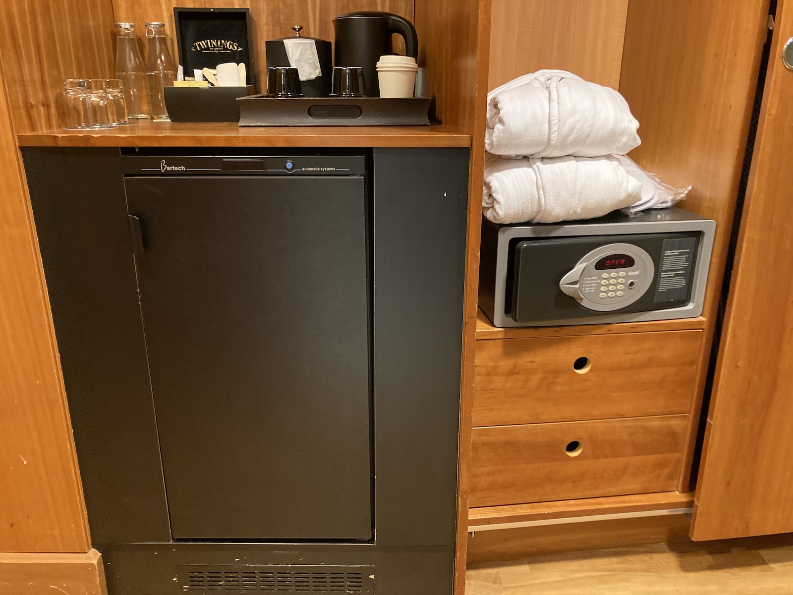 Image of mini bar and closets in our suite