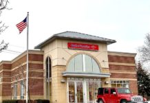 Rakuten Offering Extra Bonus for Bank of America Cards a red jeep parked in front of a bank