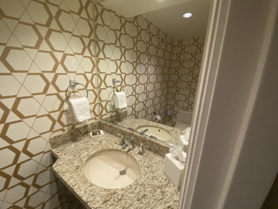 Image of sink in separated toilet room inside main bathroom
