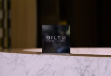 New Offer for Bilt Members, Easy 500 Hyatt Points and 15% Off Stays a black sign on a marble surface