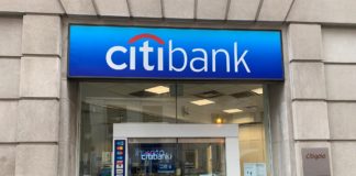 One-Day Sale, Use 15% Fewer ThankYou Points on Select Gift Cards a glass door of a bank