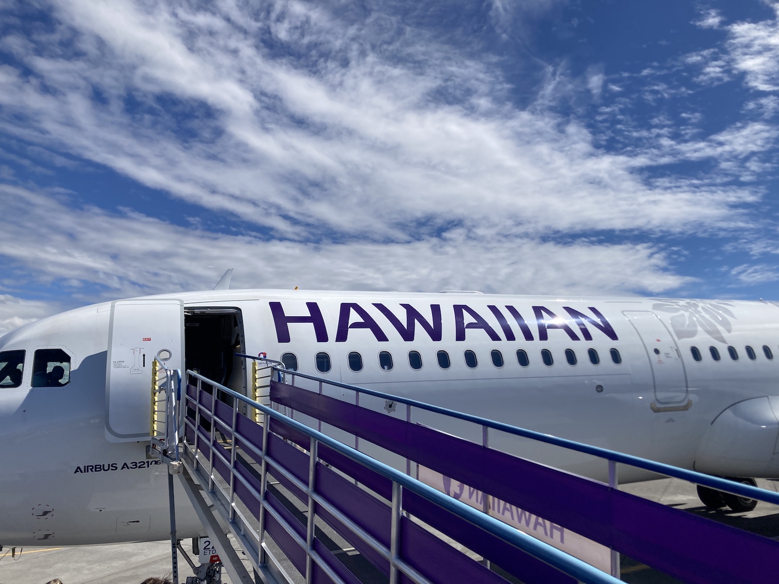 Image of walkway up to a Hawaiian Airlines plane