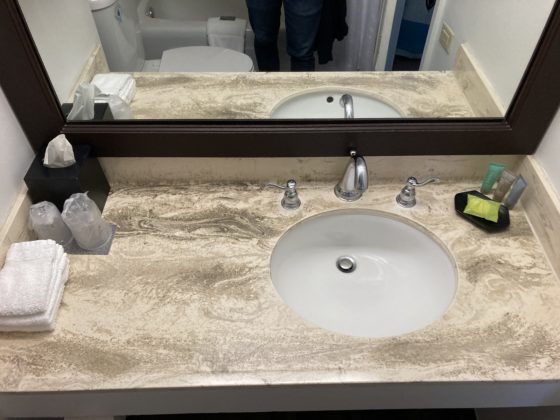 Picture of sink area with toiletries