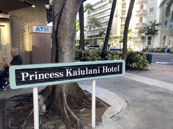 Sign noting the hotel name and entrance