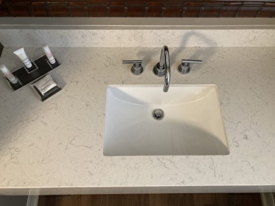 A hotel bathroom sink