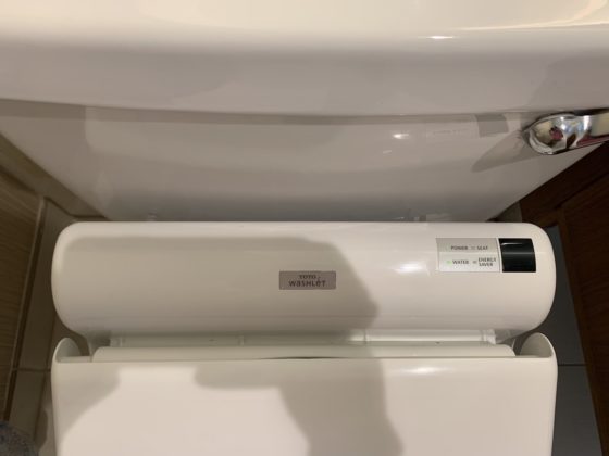Image shows the back of the toilet with its features and settings