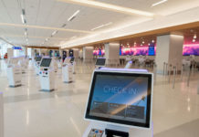 New Bonuses for American Express Delta Cards, Earn Up to 125,000 SkyMiles a check in kiosk in an airport