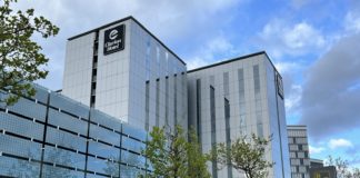 Earn Triple Points on Choice Hotels Stays Through March a group of buildings with glass walls