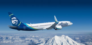 Atmos Rewards Visa Business Card, 85K Bonus Available Again an airplane flying over the clouds