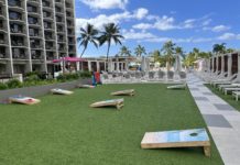 Amex Marriott Business Card Bonus: Earn 150K Points and $125 Credit a lawn with a game board and chairs