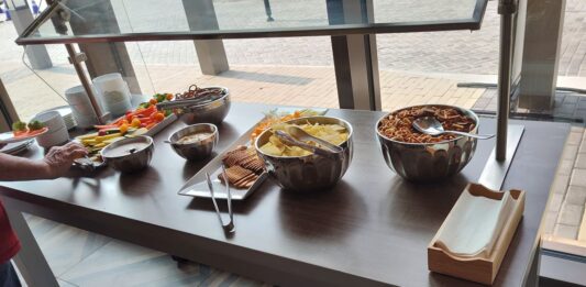 a table with bowls of food