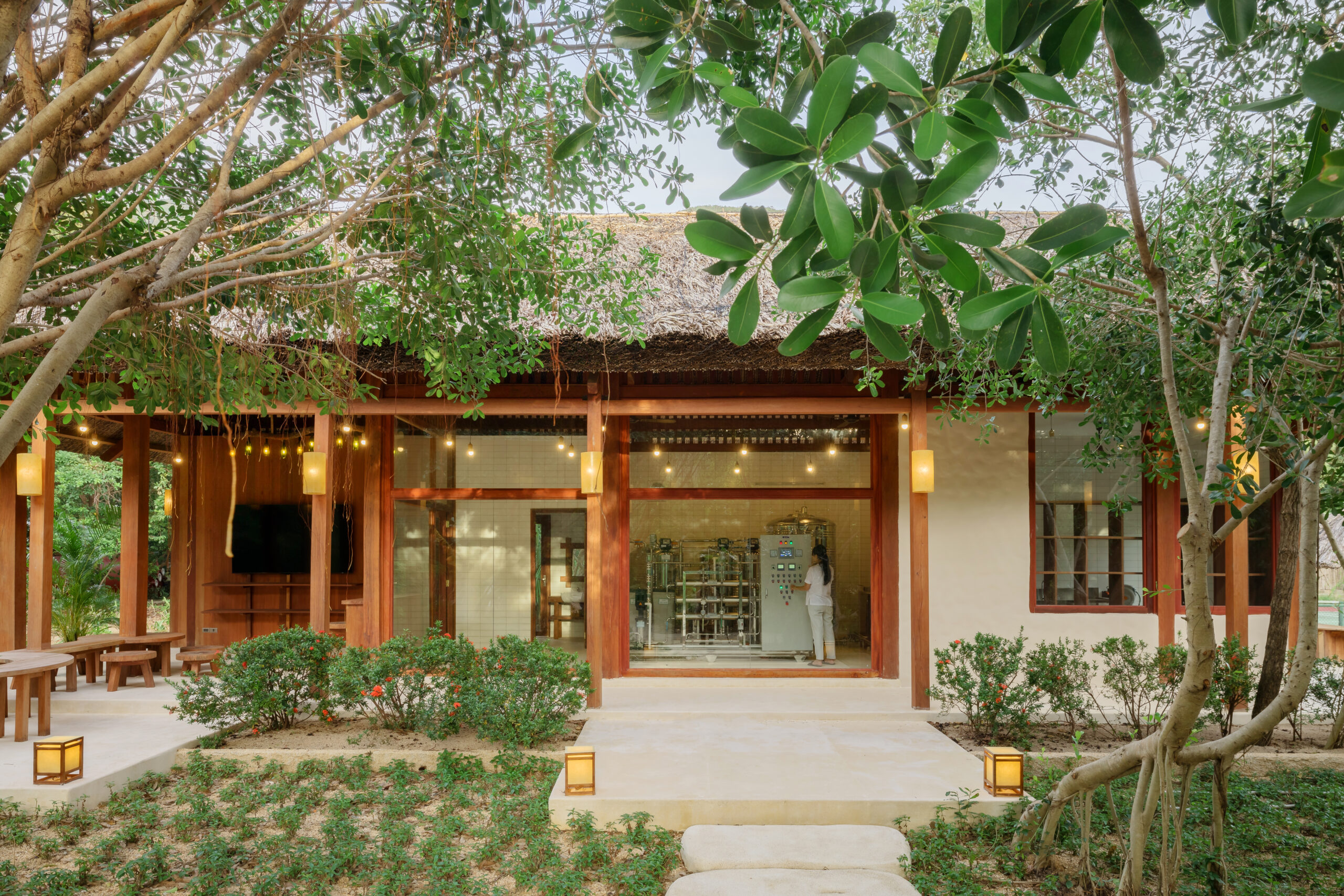 a building with a glass door and a walkway