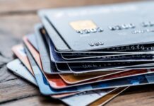 Blastoff! First Impressions of Our New Shop Your Way 5321 Cards a stack of credit cards