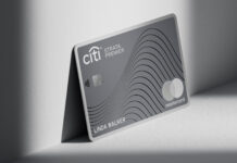 Surveys Sent Out About Possible Citi Strata Premier Revamp a grey credit card on a white surface