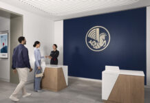 Magnifique! Why I’m Loving the Air France Card Refresh Even More Right Now a group of people standing in front of a blue wall