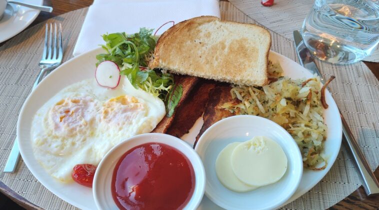 a plate of food with a fork and a knife