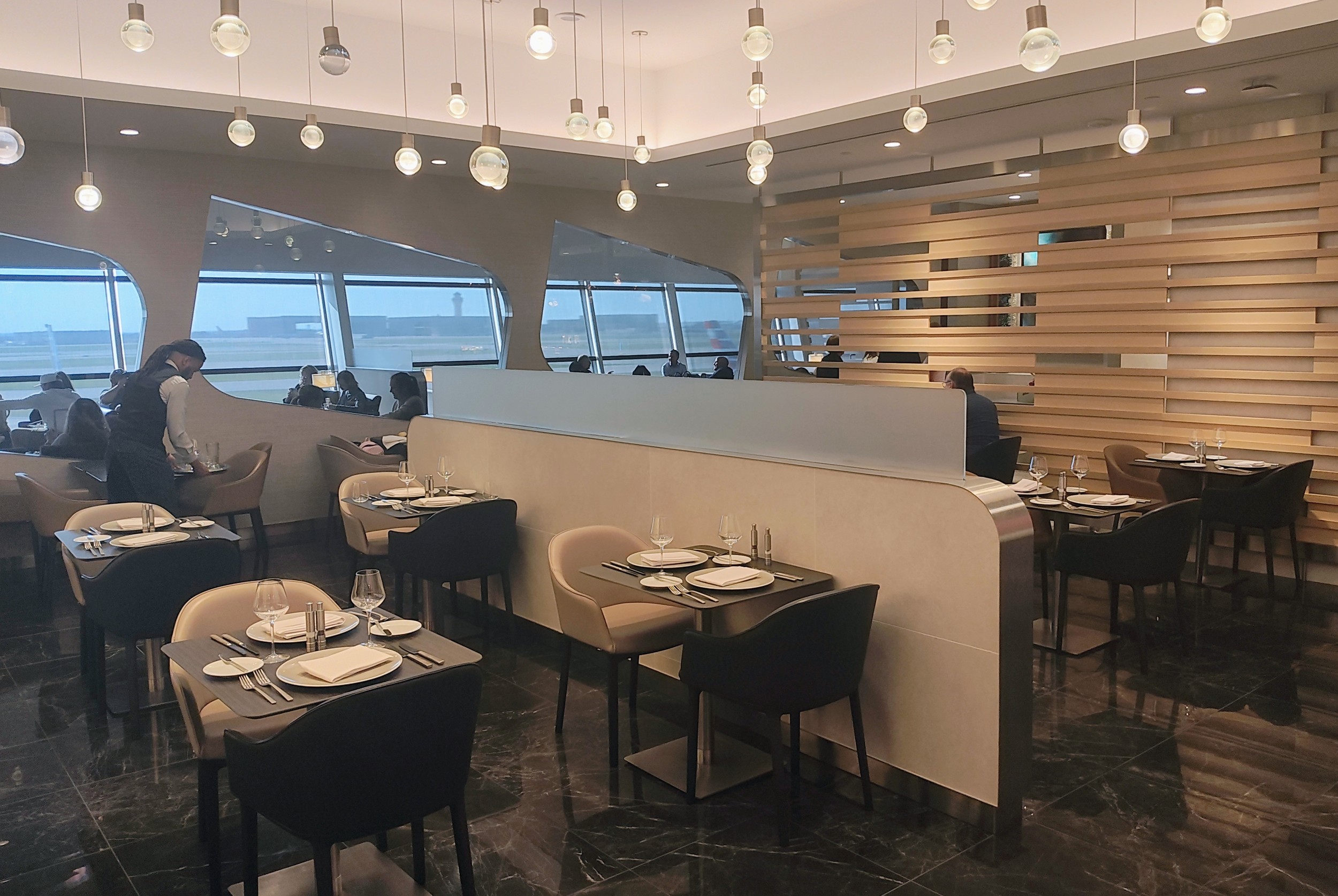 a restaurant with tables and chairs